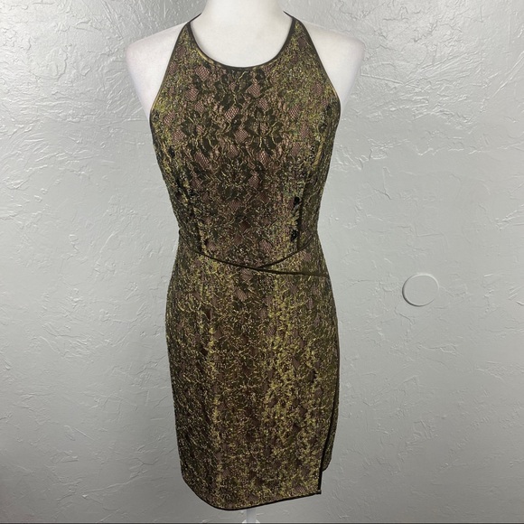 BCBGMaxAzria Dresses & Skirts - BCBG MaxAzria gold metallic lace "Tenya"
cocktail mini dress size 6